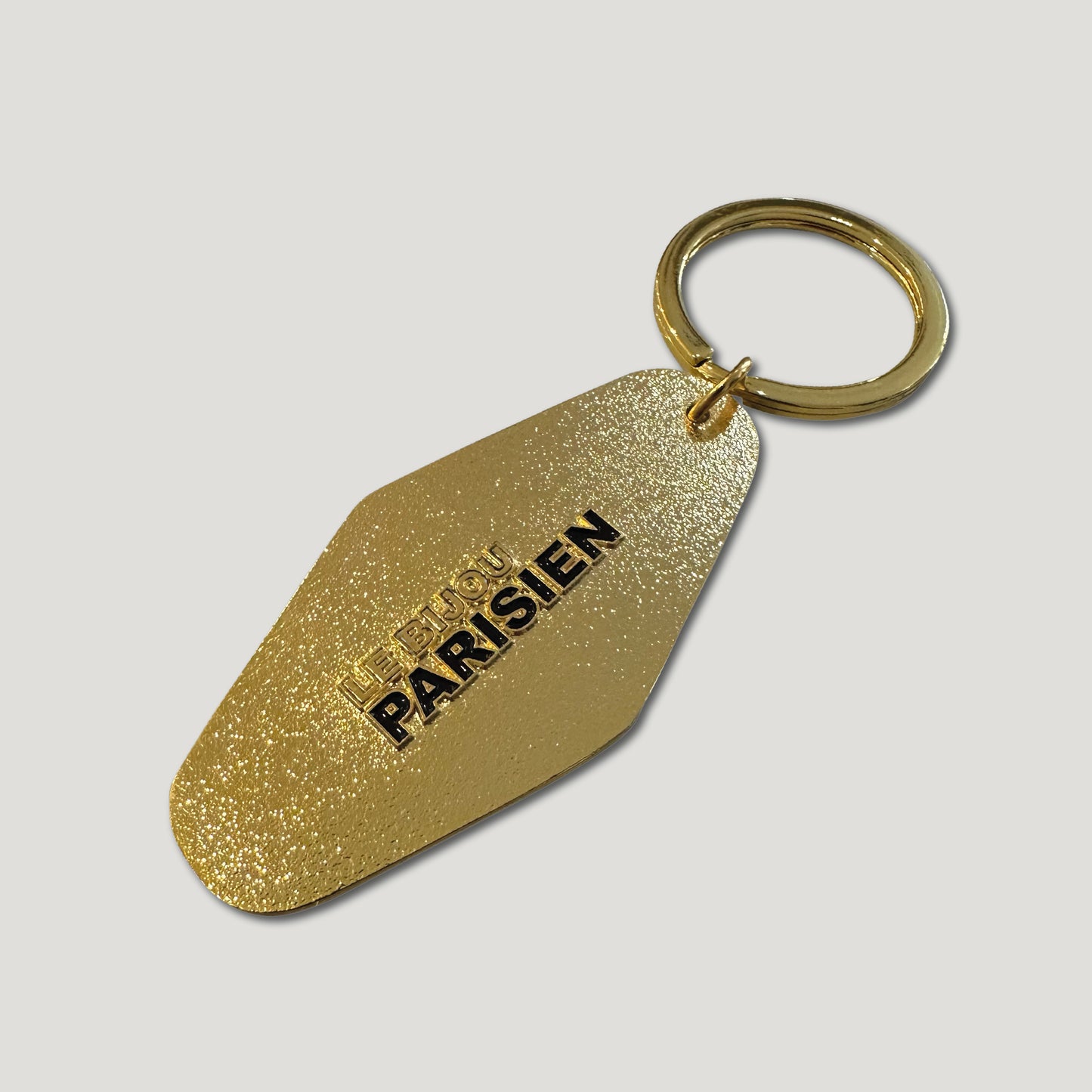 Porte-clés Parisienne en métal doré