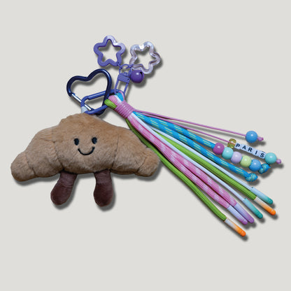 PORTE CLÉS PELUCHE CROISSANT PARISIEN - BIJOU DE SAC AVEC CHARMS