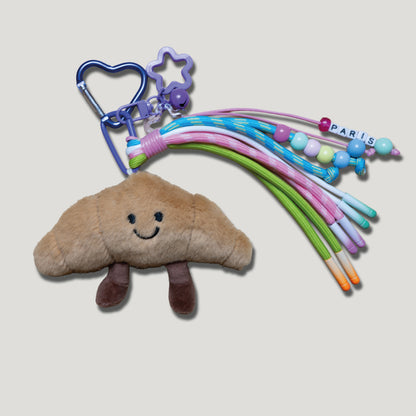 PORTE CLÉS PELUCHE CROISSANT PARISIEN - BIJOU DE SAC AVEC CHARMS